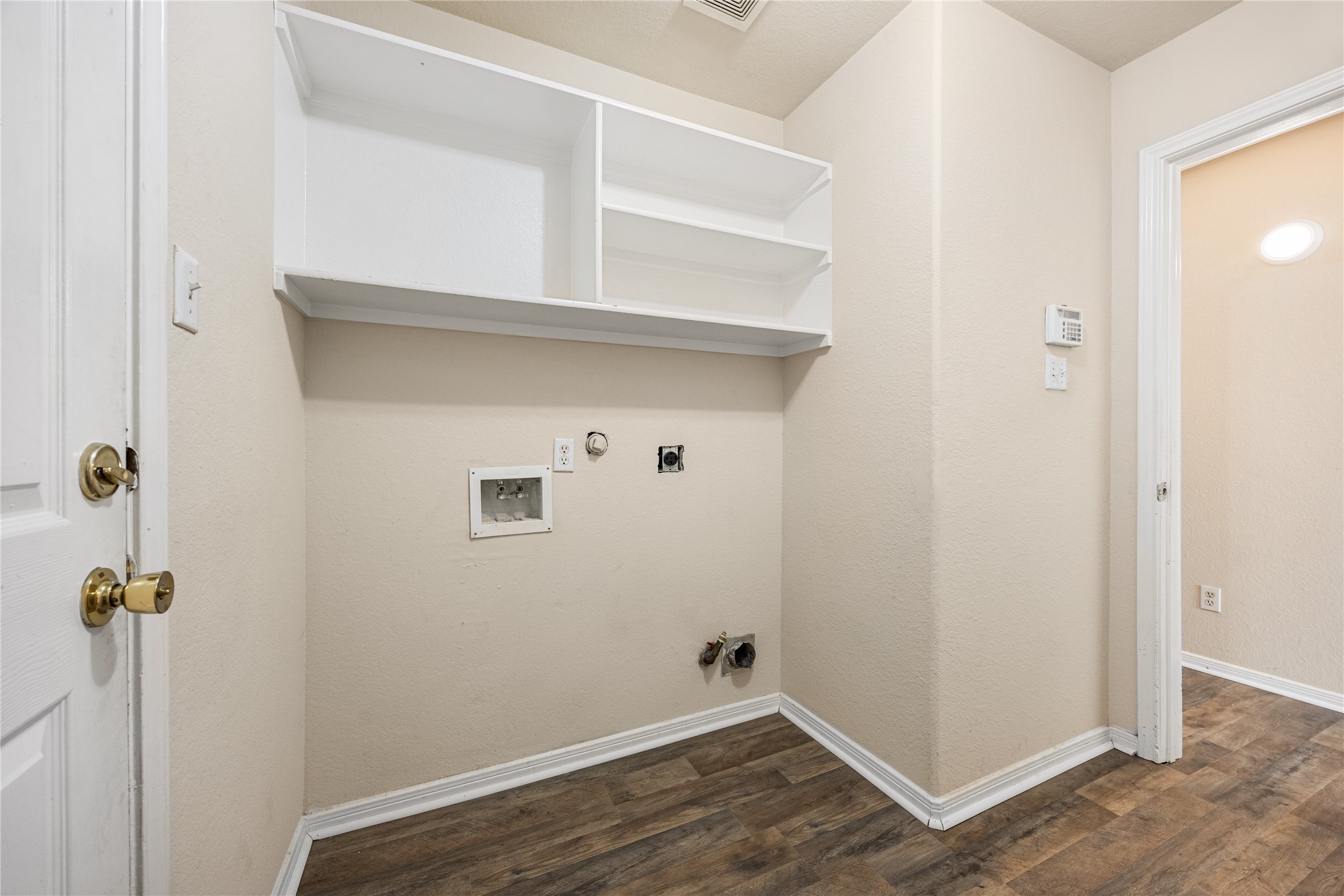 18739 Appletree Ridge Road Houston, TX 77084 - Photo 22 of 34 a view of a hallway with wooden floor
