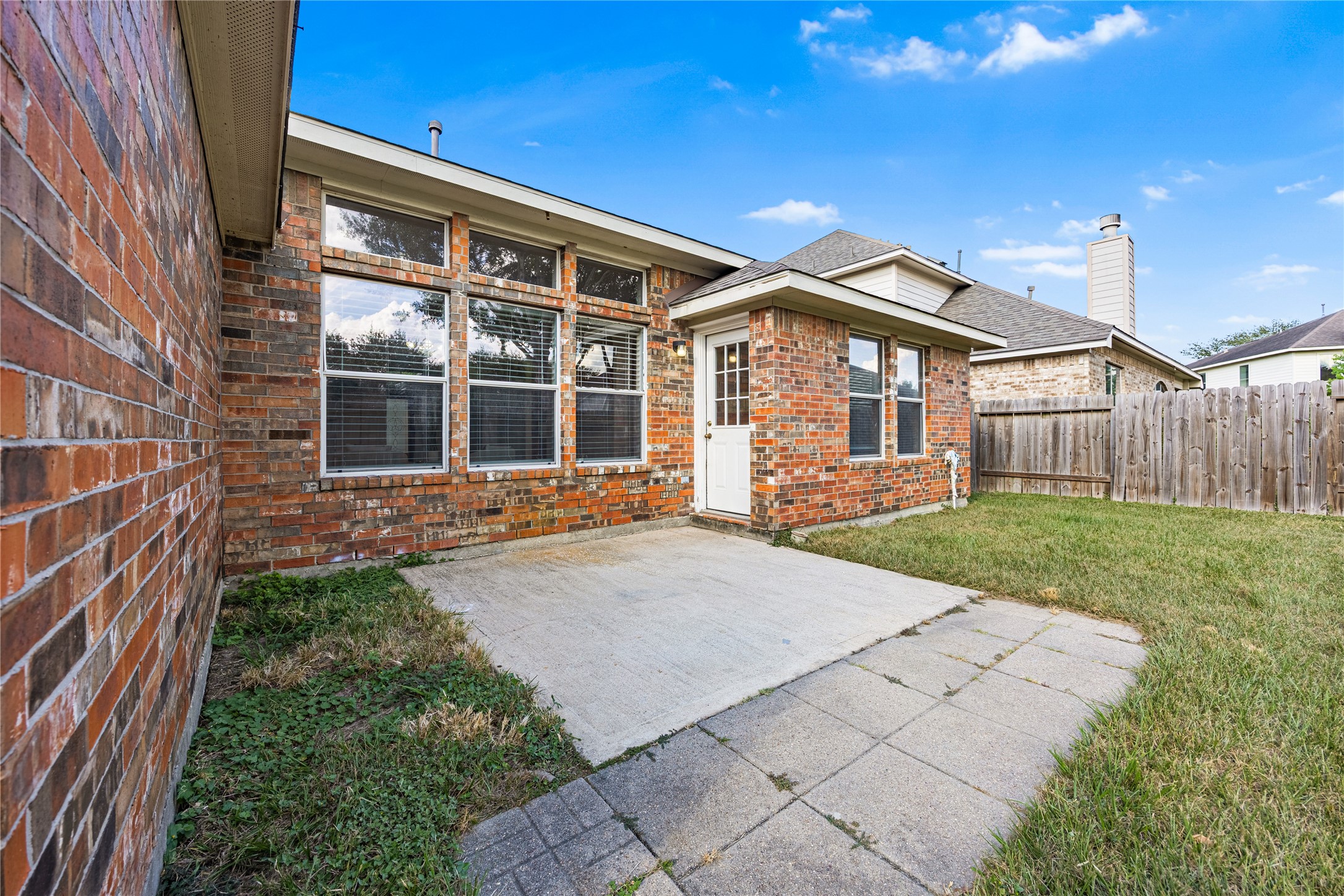 18739 Appletree Ridge Road Houston, TX 77084 - Photo 28 of 34 a front view of a house with a yard and porch