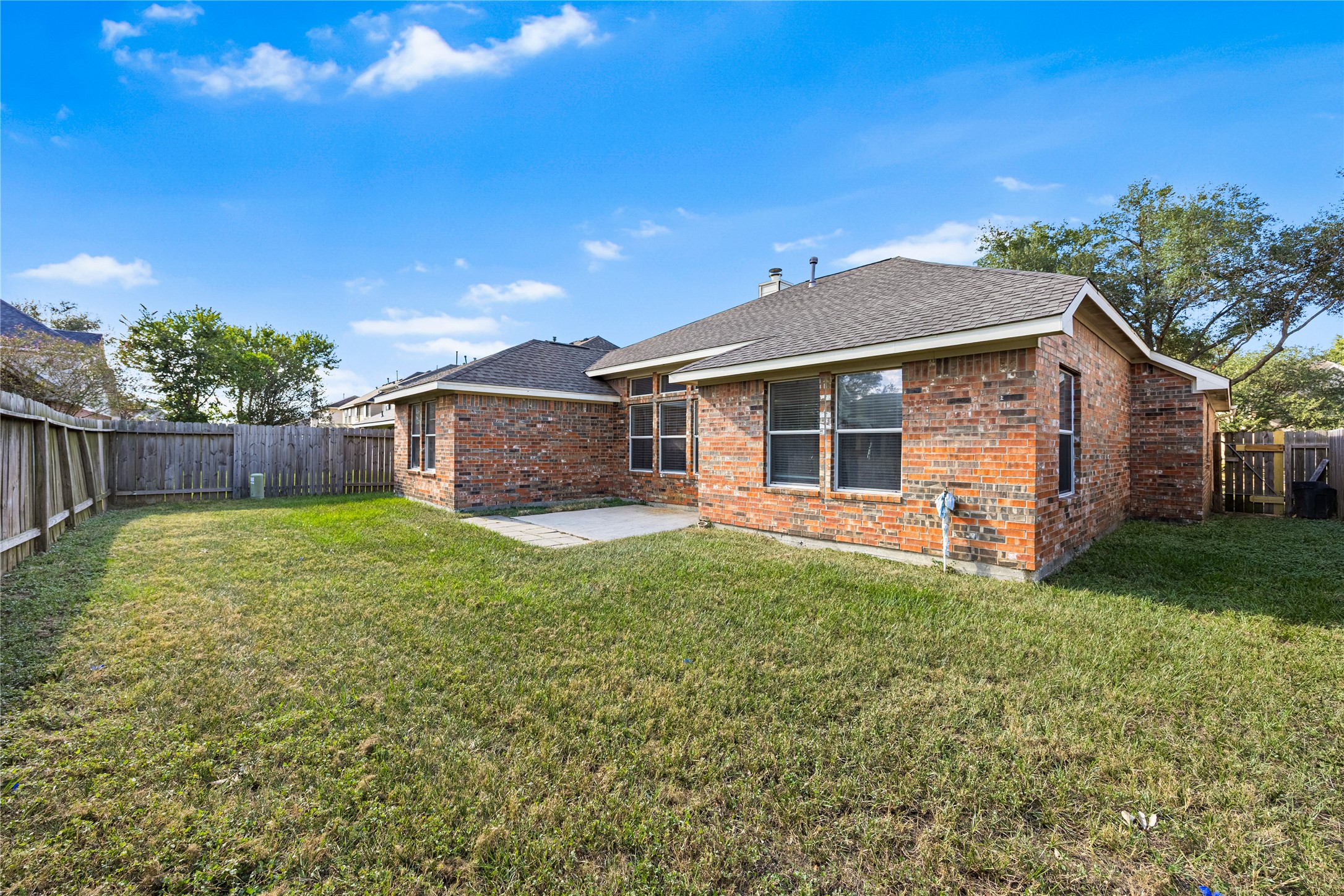 18739 Appletree Ridge Road Houston, TX 77084 - Photo 31 of 34 a front view of a house with a garden