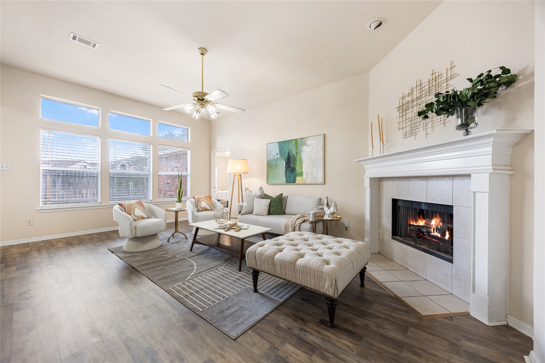 18739 Appletree Ridge Road Houston, TX 77084 - Photo 5 of 34 a living room with furniture fireplace and window
