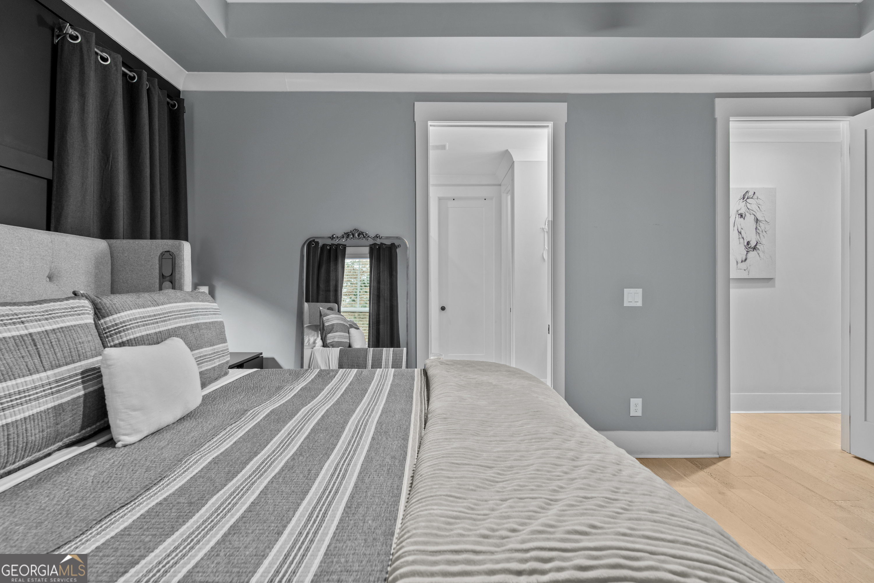 265 Federal Street Athens, GA 30607 - Photo 30 of 61 a bedroom with a bed and a walk in closet