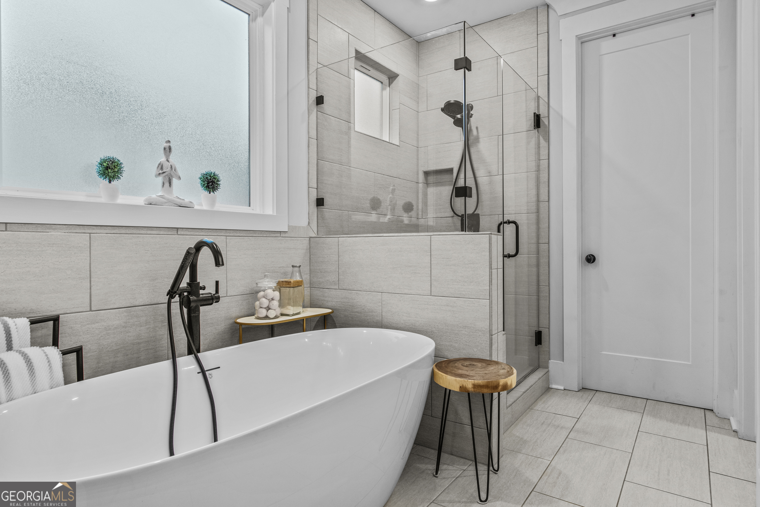 265 Federal Street Athens, GA 30607 - Photo 32 of 61 a bathroom with a sink and a bathtub