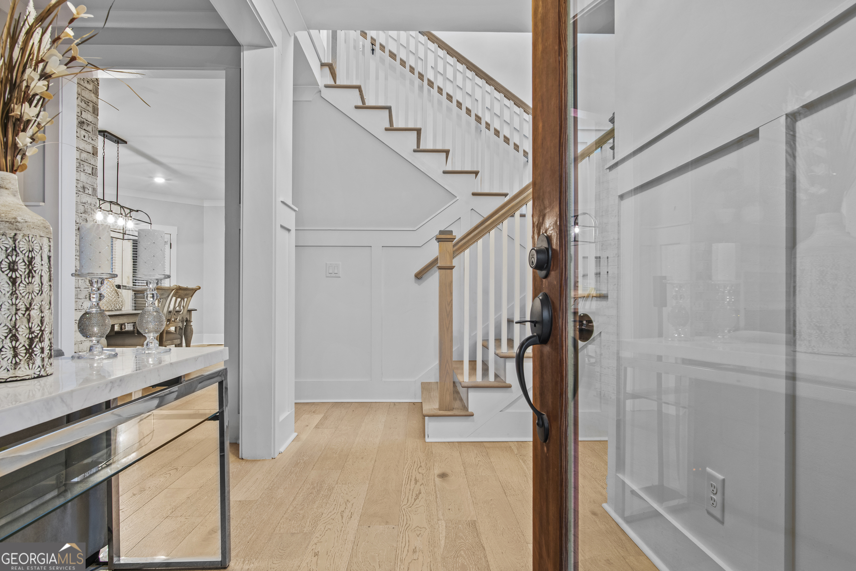 265 Federal Street Athens, GA 30607 - Photo 9 of 61 a view of hallway with stairs and wooden floor
