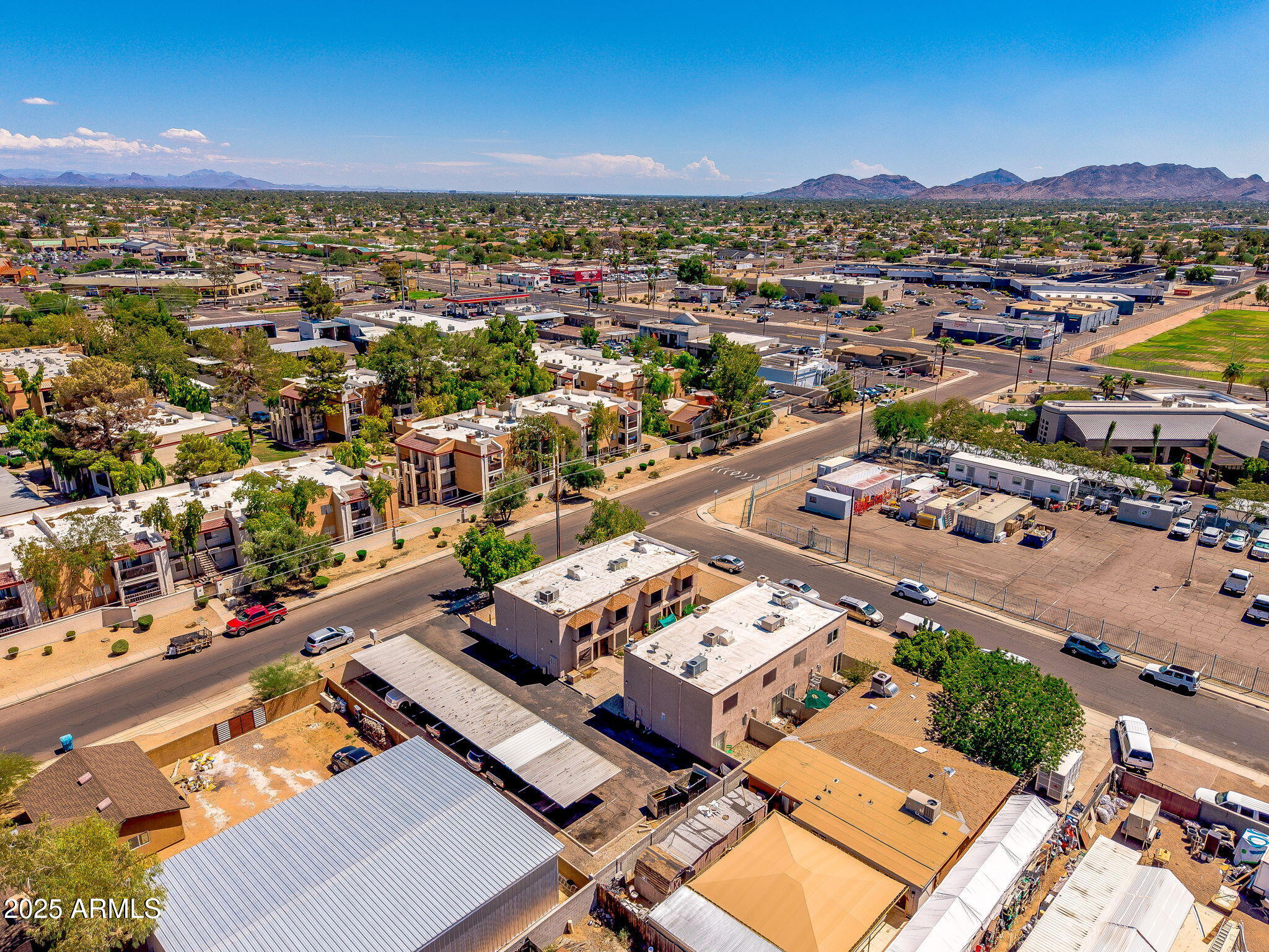 3048 East Beck Lane Phoenix, AZ 85032 - Photo 2 of 13 an aerial view of a city with lots of residential buildings