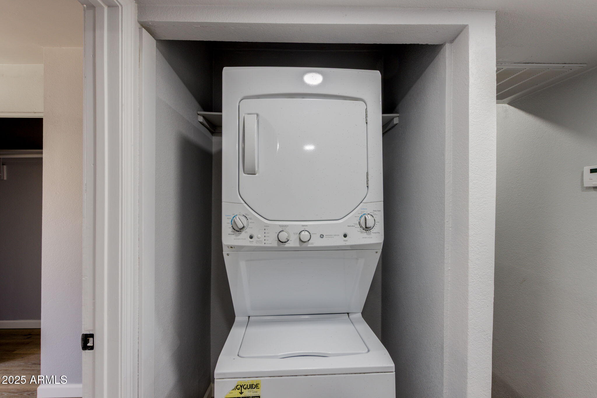 3048 East Beck Lane Phoenix, AZ 85032 - Photo 5 of 13 a utility room with dryer and washer