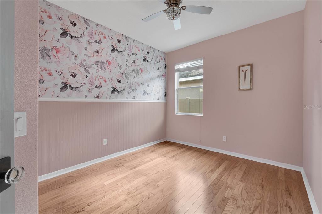 10229 Avelar Ridge Drive Riverview, FL 33578 - Photo 21 of 39 a view of an empty room with a window and a dresser