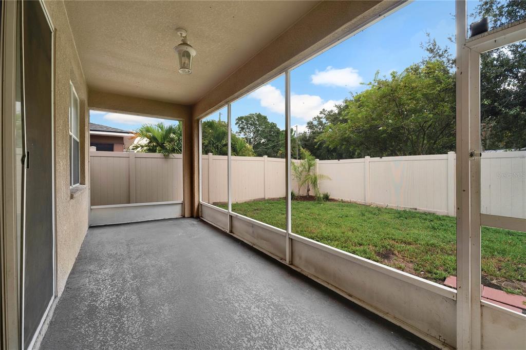 10229 Avelar Ridge Drive Riverview, FL 33578 - Photo 28 of 39 a view of a garden from a window