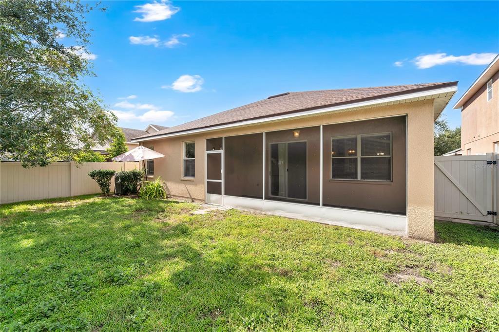 10229 Avelar Ridge Drive Riverview, FL 33578 - Photo 31 of 39 a house view with a garden space