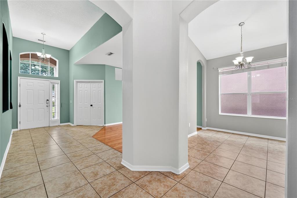 10229 Avelar Ridge Drive Riverview, FL 33578 - Photo 6 of 39 a view of livingroom with hardwood floor and window