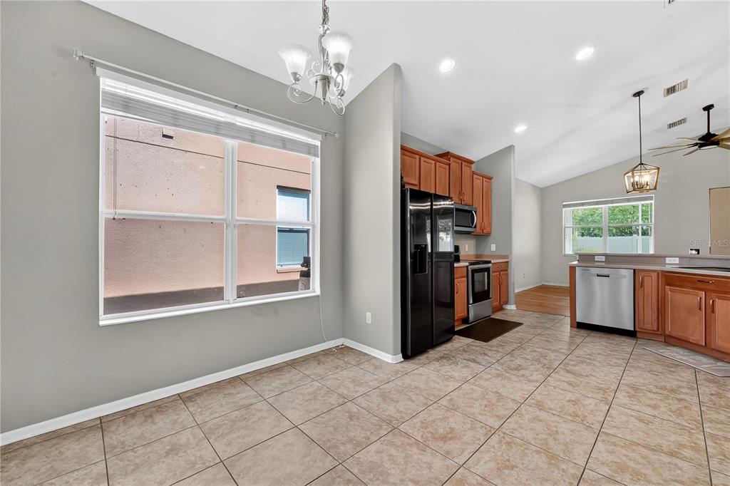 10229 Avelar Ridge Drive Riverview, FL 33578 - Photo 7 of 39 a view of a kitchen with a sink and cabinets