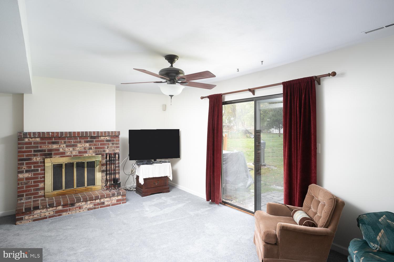 561 Flock Road Hamilton, NJ 08690 - Photo 14 of 35 First floor family room with woodburning fireplace