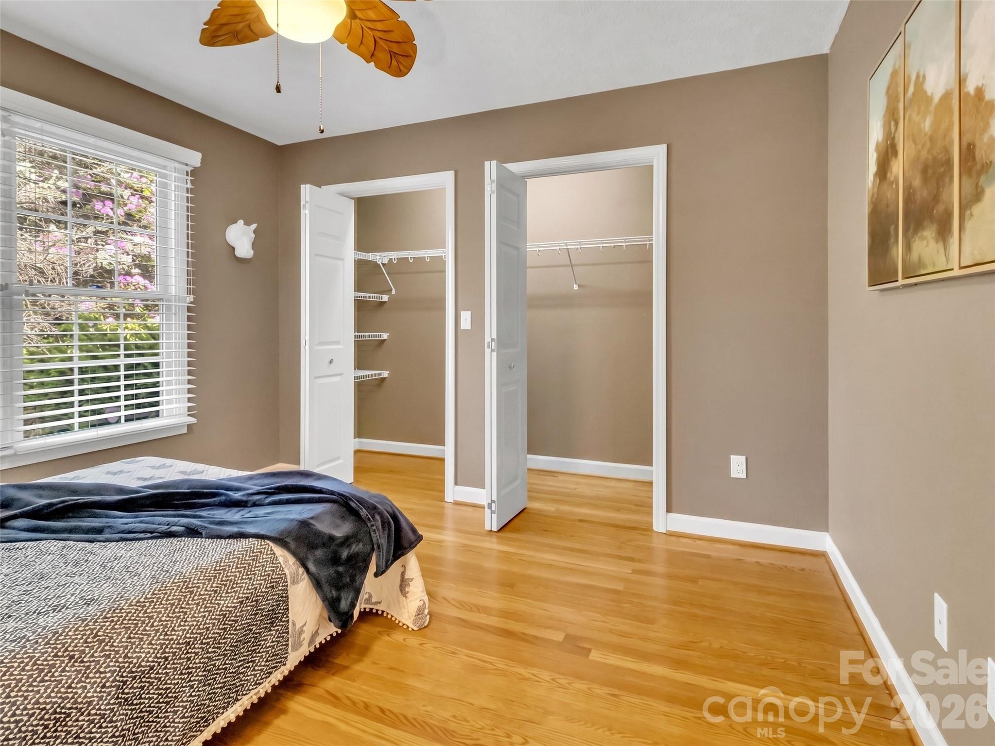 88 Adams Drive Clyde, NC 28721 - Photo 20 of 47 a bedroom with a bed and a window