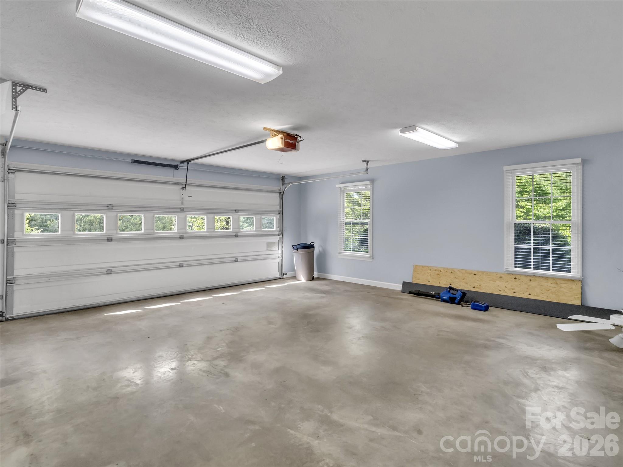 88 Adams Drive Clyde, NC 28721 - Photo 31 of 47 a view of an empty room with a window