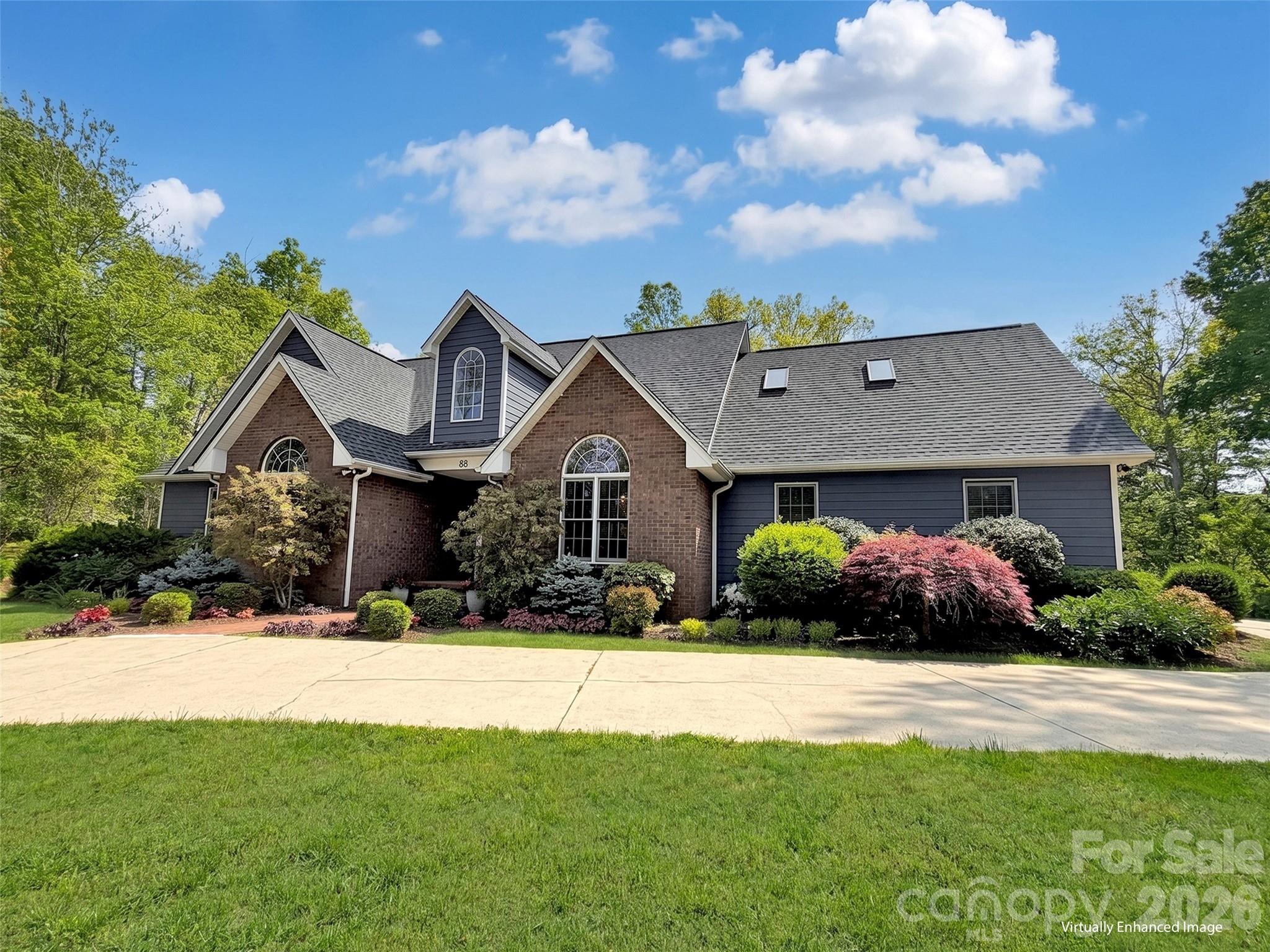 88 Adams Drive Clyde, NC 28721 - Photo 44 of 47 a front view of a house with a yard