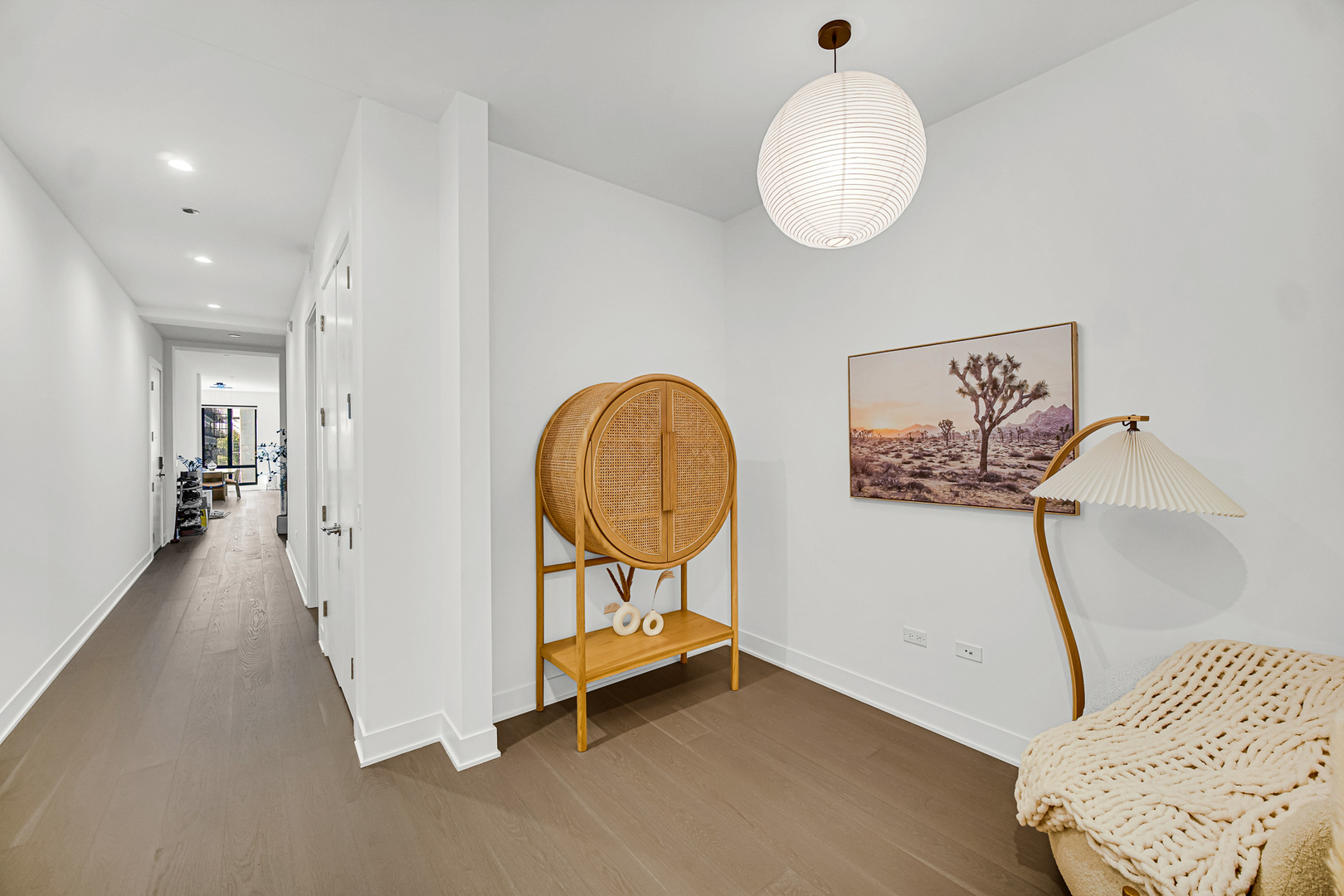 323 South Racine Avenue, Unit 5A Chicago, IL 60607 - Photo 11 of 26 a view of a hallway with entryway wooden floor and front door