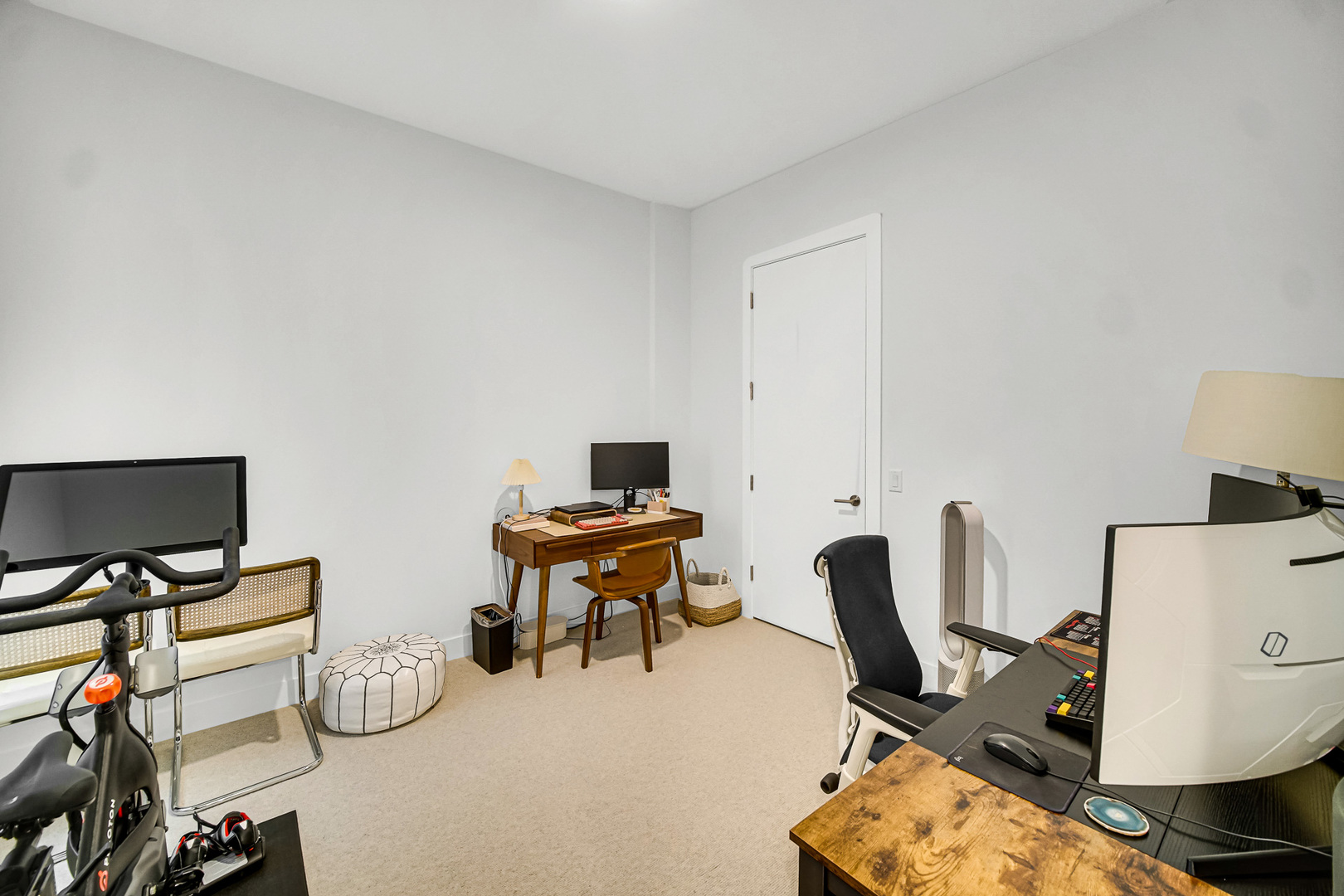 323 South Racine Avenue, Unit 5A Chicago, IL 60607 - Photo 19 of 26 a view of a workspace with furniture and a window