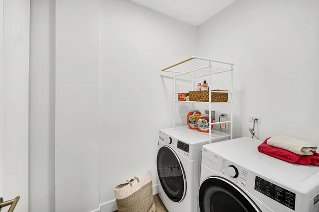 a utility room with dryer and washer