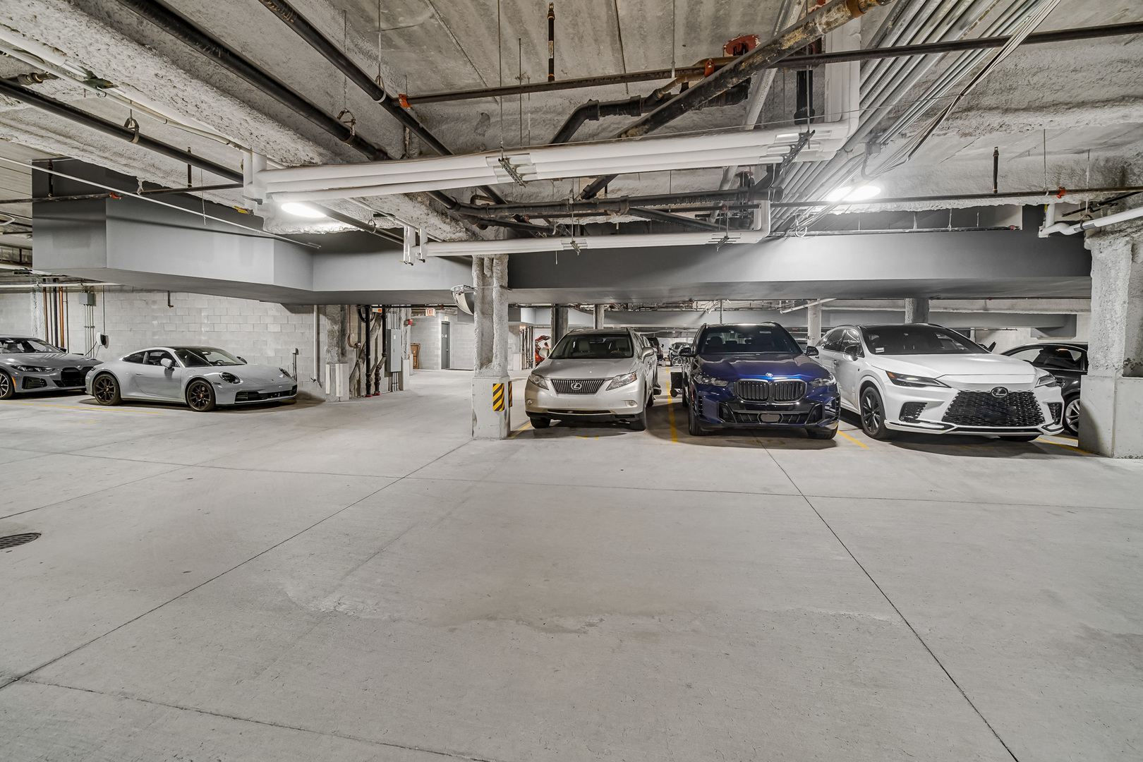 323 South Racine Avenue, Unit 5A Chicago, IL 60607 - Photo 23 of 26 a view of parking garage with cars