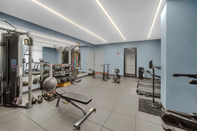 a view of a room with gym equipment