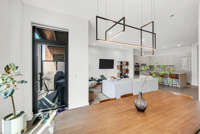 a view of a living room and bathroom
