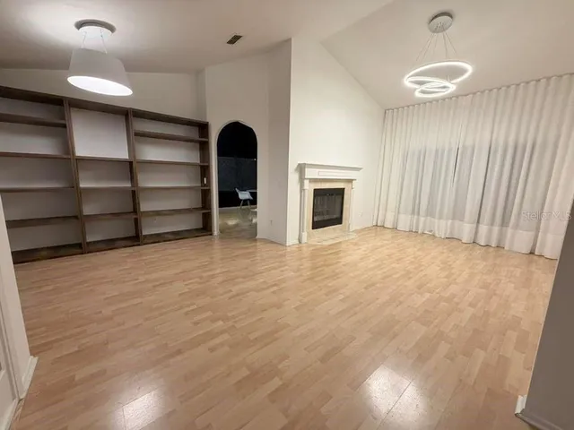 a view of a livingroom with a furniture