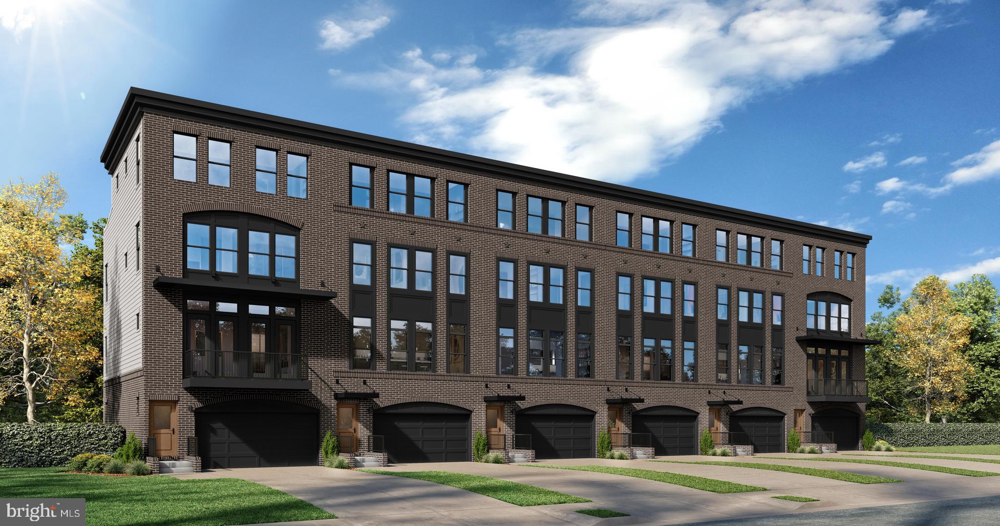 a front view of building with yard