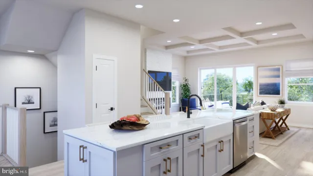 a kitchen with counter top space and windows