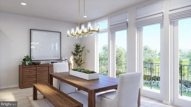 a view of a dining room with furniture and window