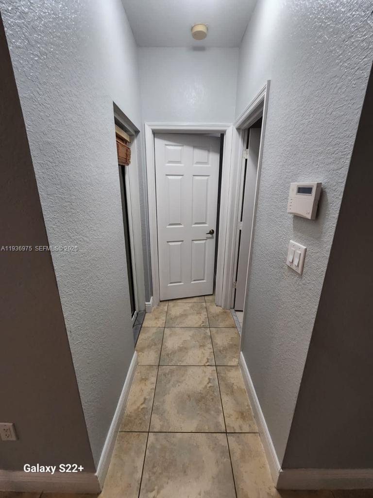3187 Southwest 143rd Place Miami, FL 33175 - Photo 15 of 22 a view of a hallway