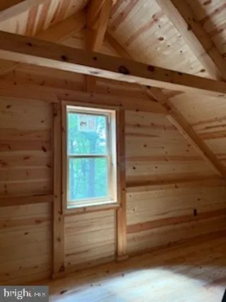 a backyard of a house with large trees