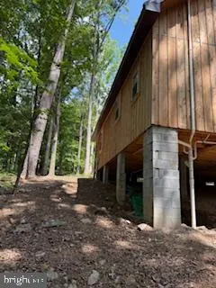 a view of a yard and mountain view