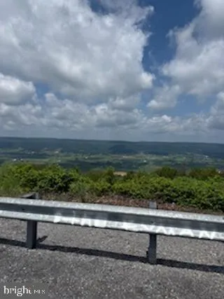 a house with trees in the background