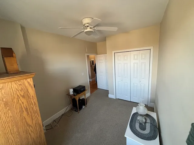 a view of hallway with washer and dryer