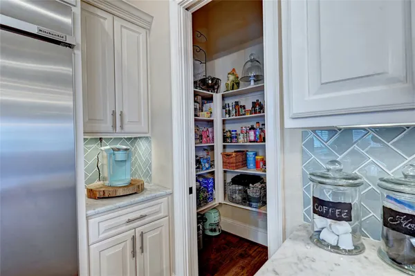 a room with storage and utility