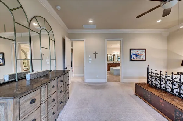 a spacious bathroom with a double vanity sink and a large mirror