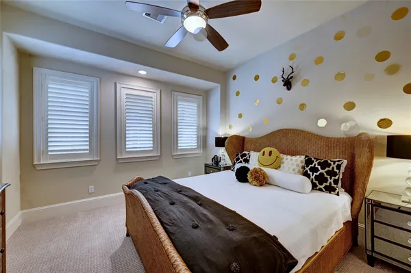 a bedroom with bed and window