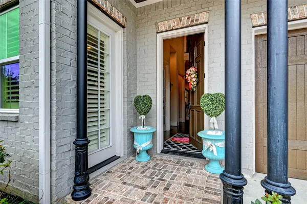 a view of a hallway with front door
