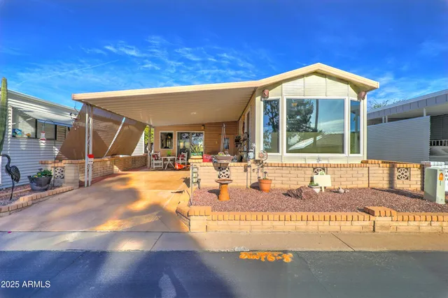 a view of a house with entertaining space
