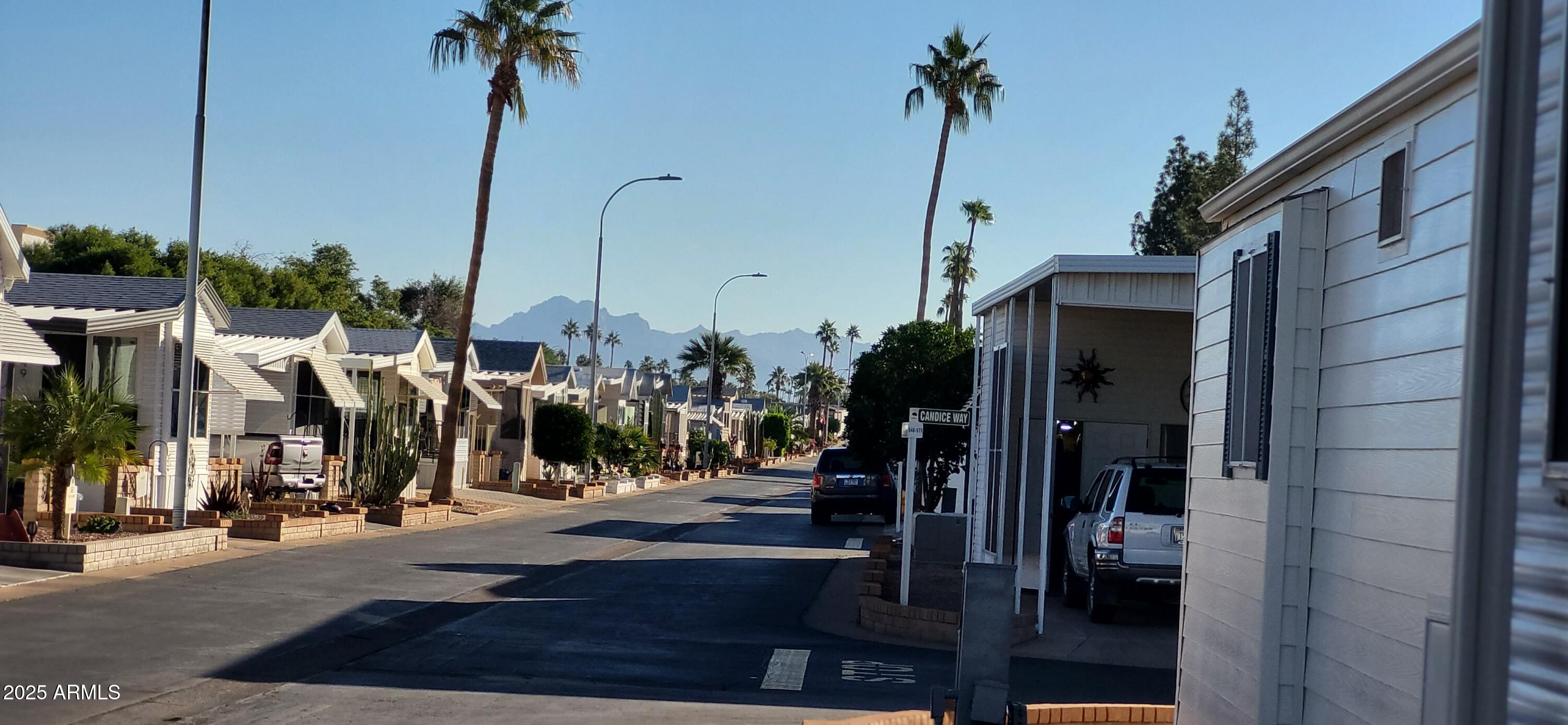 111 South Greenfield Road, Unit 633 Mesa, AZ 85206 - Photo 31 of 32 a view of a street with cars