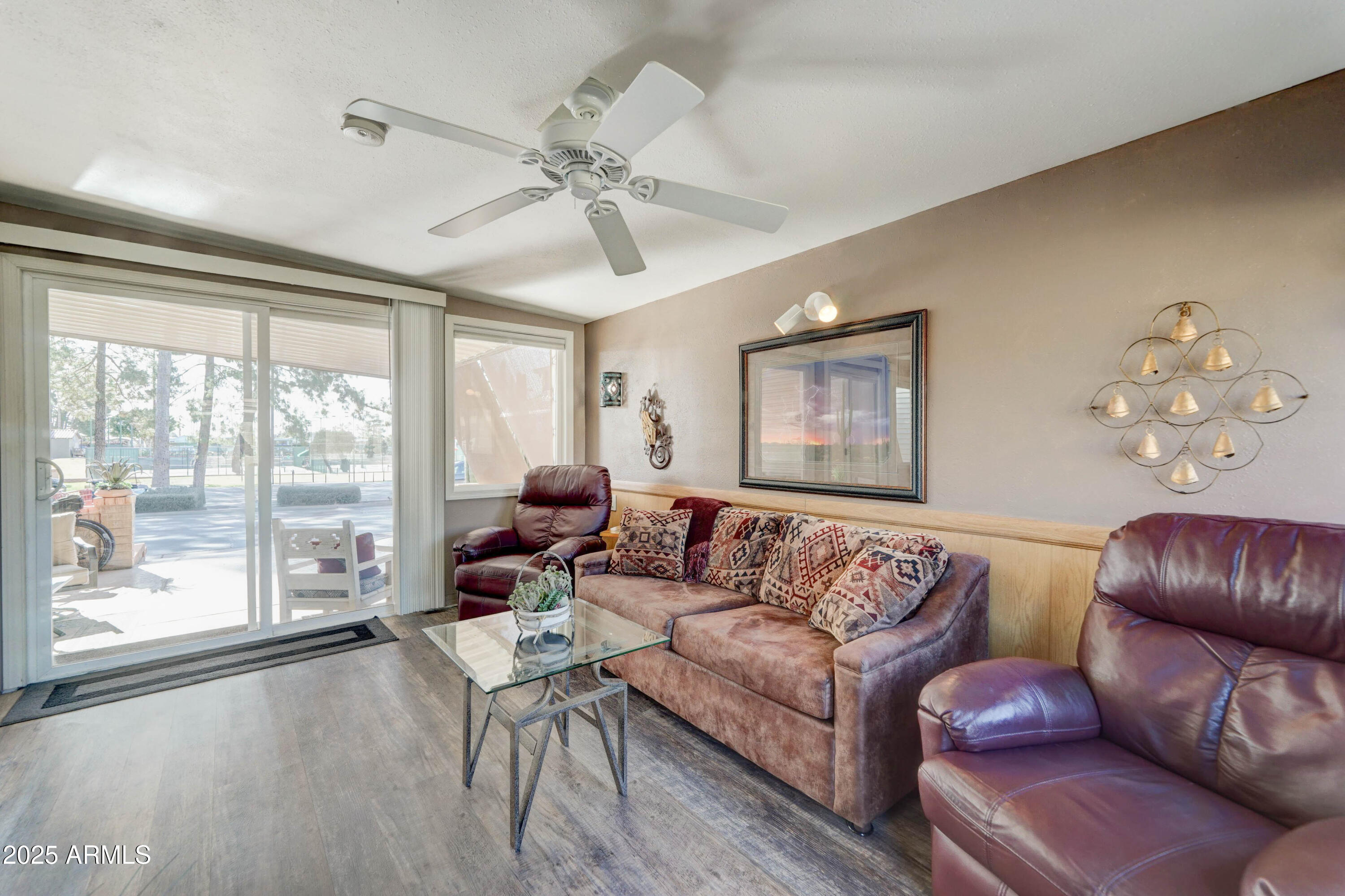 111 South Greenfield Road, Unit 633 Mesa, AZ 85206 - Photo 6 of 32 a living room with furniture and a large window