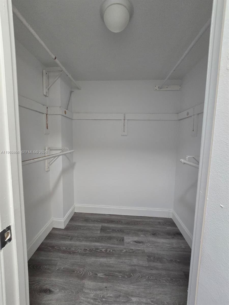 6500 Cypress Road, Unit 301 Plantation, FL 33317 - Photo 10 of 15 a view of a room with racks on the wall