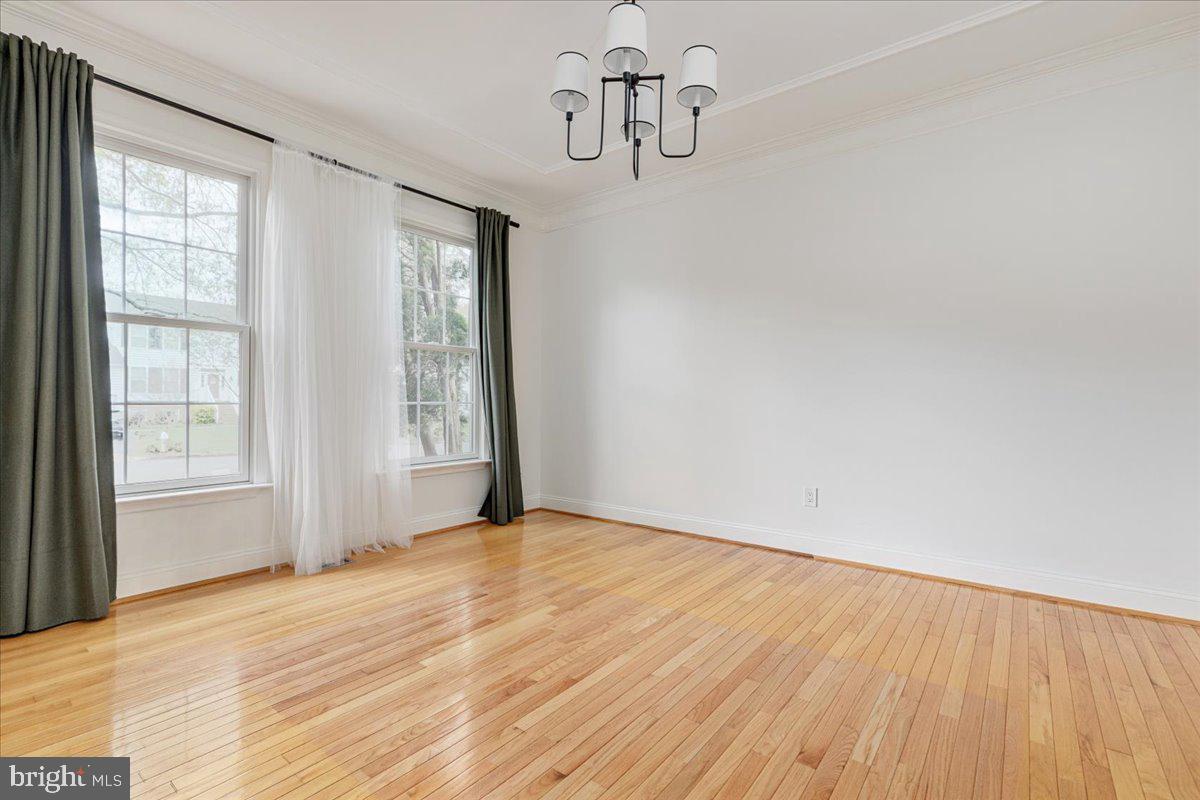 8747 Diamond Hill Drive Bristow, VA 20136 - Photo 16 of 38 a view of an empty room with wooden floor and windows