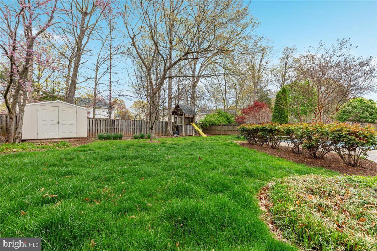 8747 Diamond Hill Drive Bristow, VA 20136 - Photo 36 of 38 a view of a backyard with garden