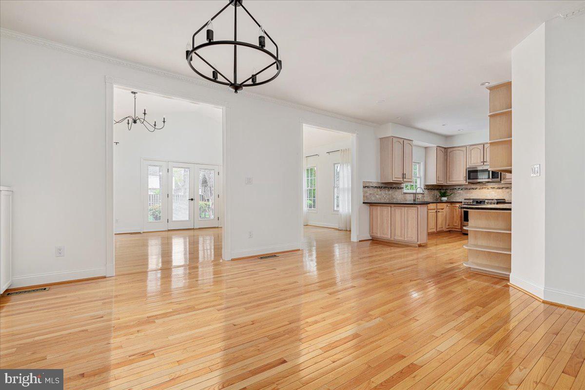 8747 Diamond Hill Drive Bristow, VA 20136 - Photo 10 of 38 a view of kitchen with cabinets and wooden floor