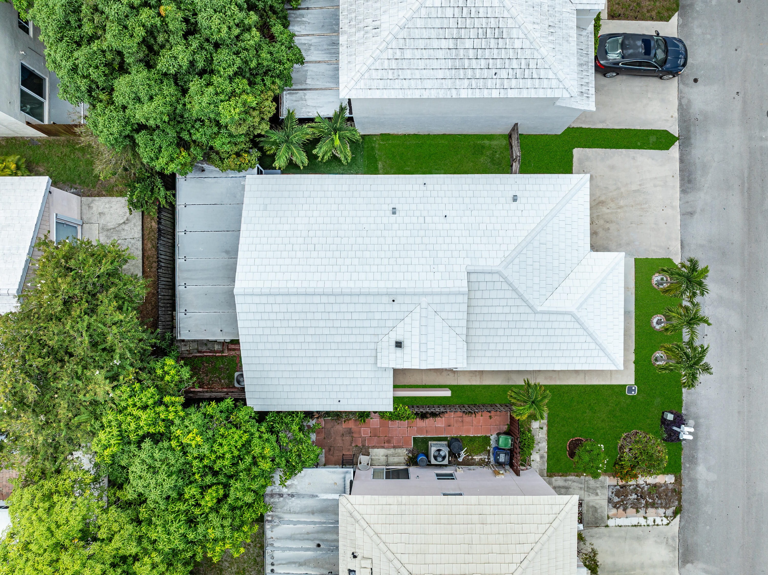 3084 Lighthouse Place Margate, FL 33063 - Photo 28 of 41 an aerial view of a house with a yard and sitting area