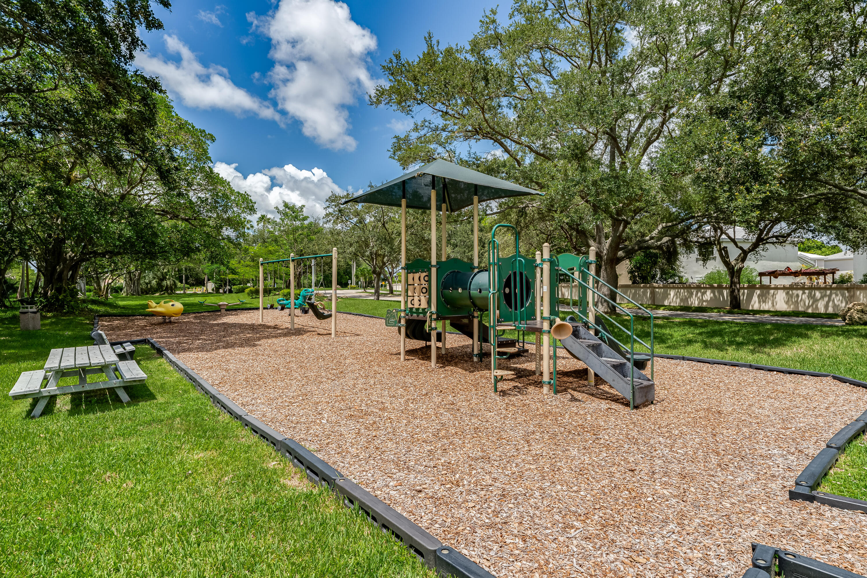 3084 Lighthouse Place Margate, FL 33063 - Photo 30 of 41 a view of a park with slide