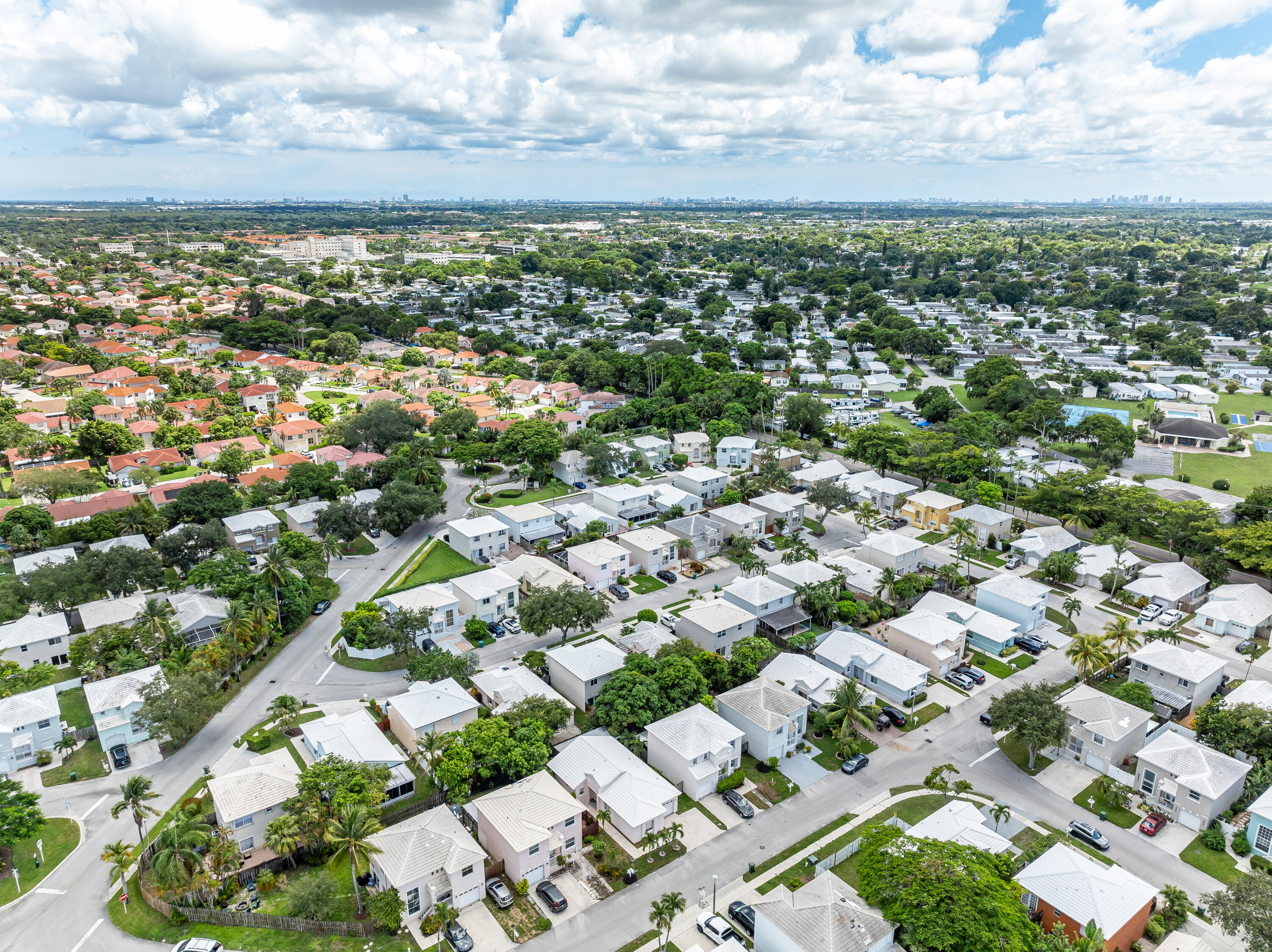 3084 Lighthouse Place Margate, FL 33063 - Photo 35 of 41 an aerial view of residential houses with city view