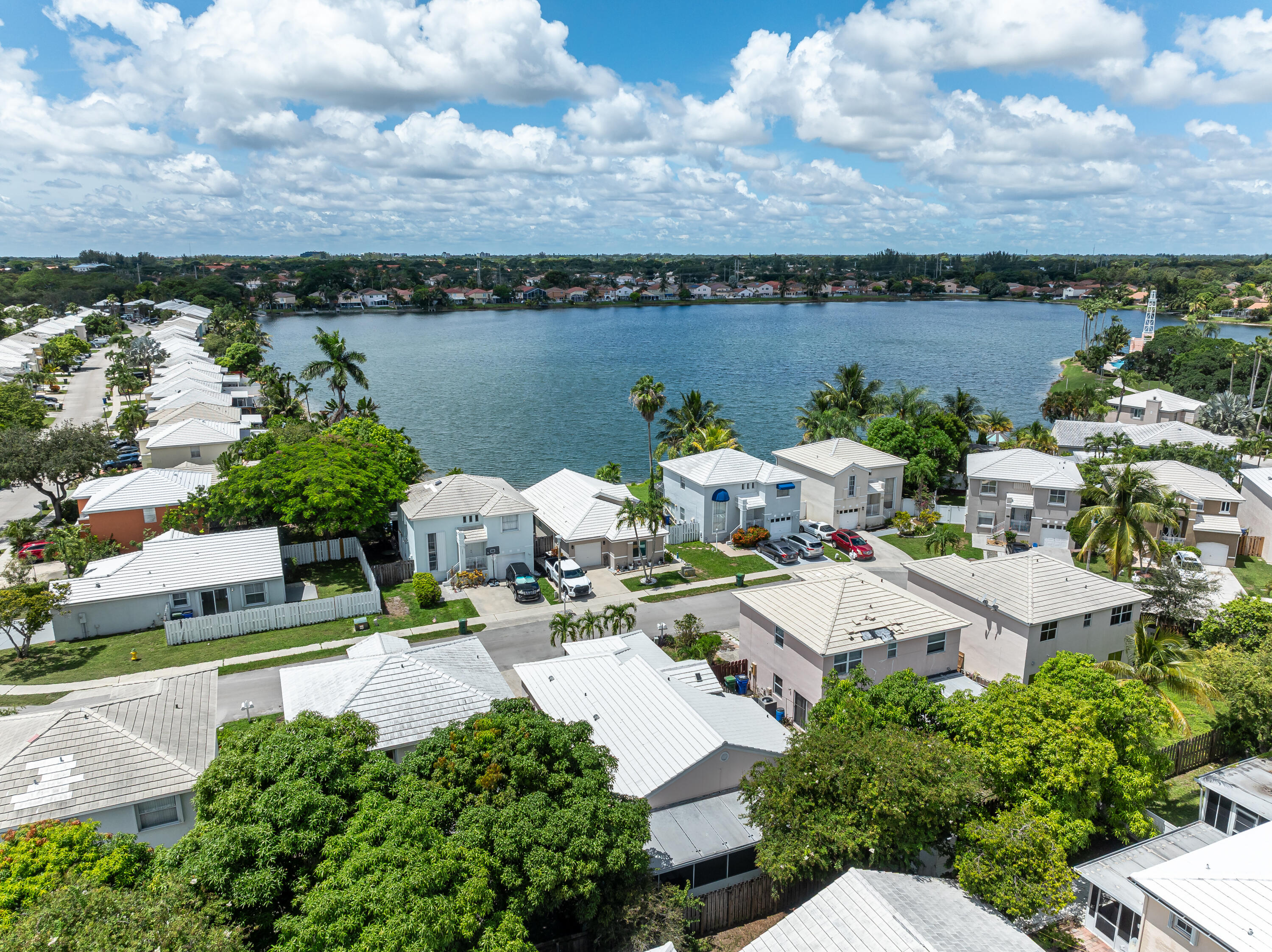 3084 Lighthouse Place Margate, FL 33063 - Photo 39 of 41 an aerial view of a house with lake view