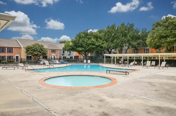 a view of a garden and basketball court