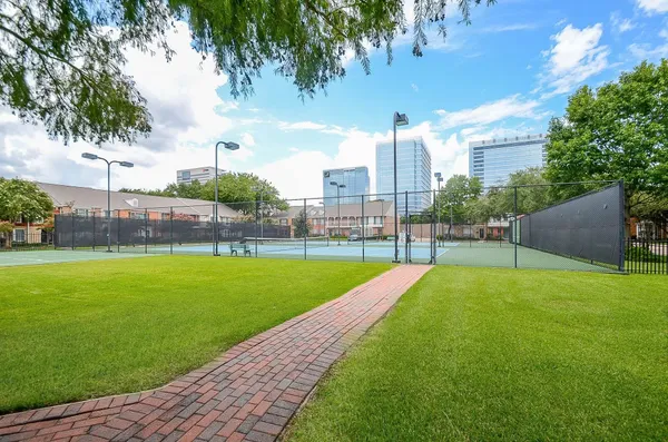 a view of swimming pool with a yard
